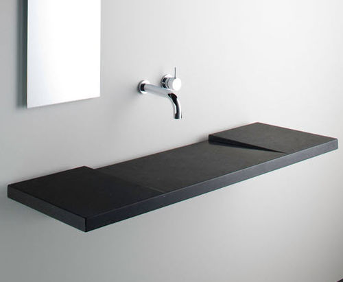 Lavabo sospeso - GEO  - Omvivo - in pietra / con piano integrato / rettangolare