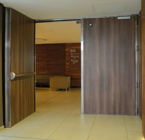 Porta in HPL - SIGMA - Andreu Barberá, S.L. - da interno / in acciaio inossidabile / battente