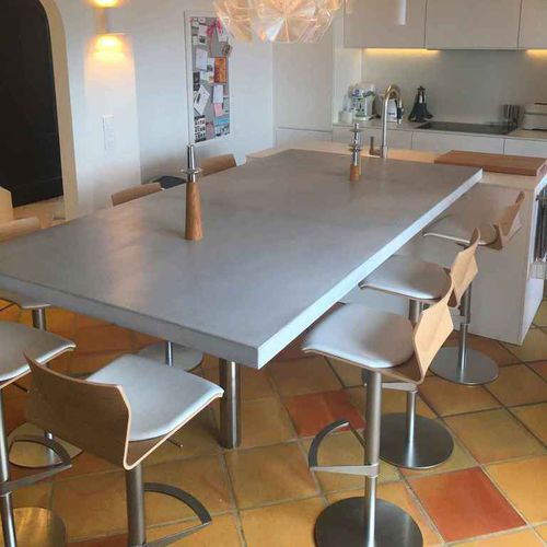 Tavolo da pranzo contemporaneo - BALIAN BETON Atelier - in calcestruzzo HUP Ductal© / in acciaio / in acciaio inossidabile