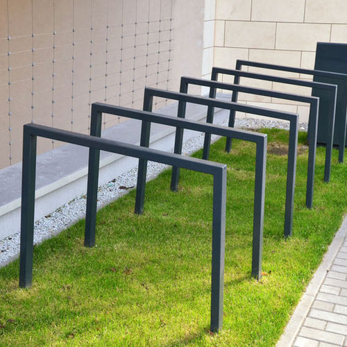 Rastrelliera per biciclette a pavimento - BOSTON - Komserwis Sp. z o.o. - per spazi pubblici / in acciaio inossidabile / in acciaio verniciato