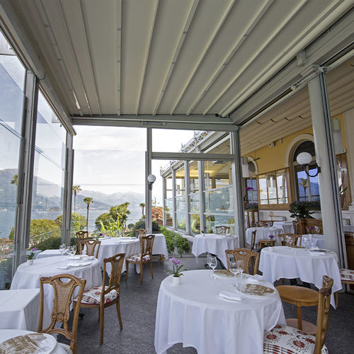 Pergola addossata - T1 - KE Outdoor Design - autoportante / in alluminio / con copertura in tela