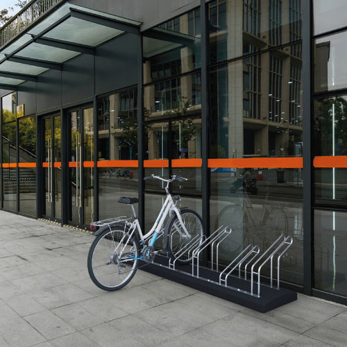 Poggia-biciclette a pavimento - UP DOWN - BELLITALIA - per spazio pubblico / in acciaio con rivestimento a polvere / in pietra ricostituita