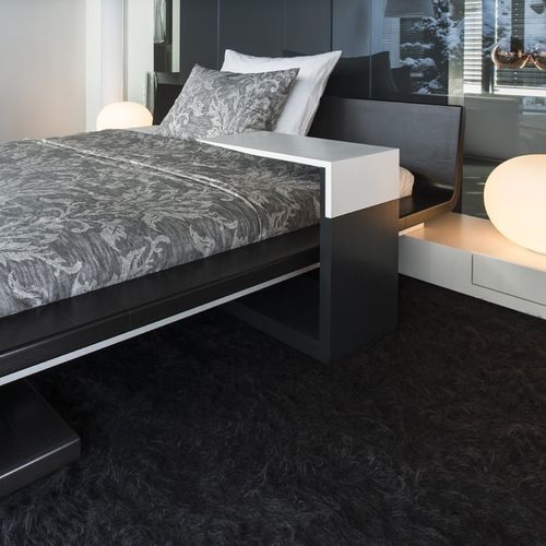 Tavolo d'appoggio contemporaneo - SLIDER - Steininger Designers - in Corian® / con supporto in legno massiccio / con base in melamina