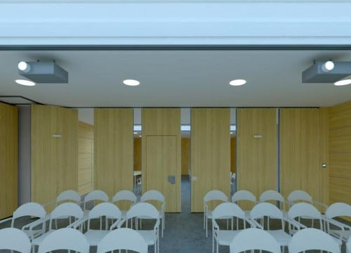 Parete scorrevole impilabile - MAXPARETE - Oddicini Industrie - in laminato / professionale / a comando elettrico