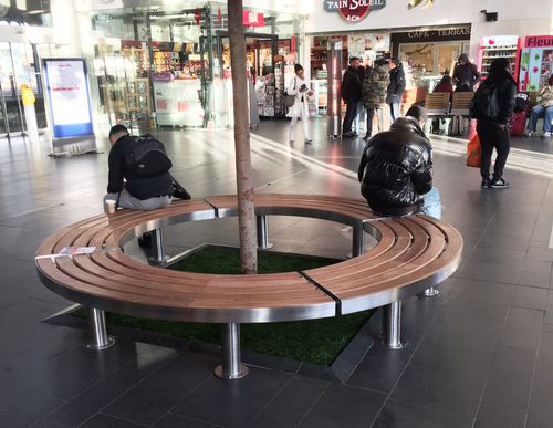 Panca per spazi pubblici contemporanea - TREE SEAT - TREE BENCH - NORCOR MOB.URBAIN - in legno esotico / in acciaio inossidabile / con schienale