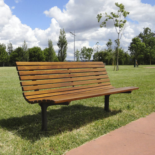 Panca per spazi pubblici contemporanea - AXIS - LARUS DESIGN - in legno / in ghisa / con schienale