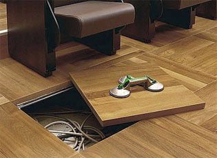 Pavimento sopraelevato in legno - Jindao Floors - da interno / perforato