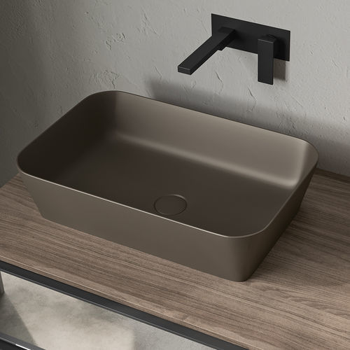 Lavabo da appoggio - SAMOA - Inda - in ceramica / con piano integrato / rettangolare