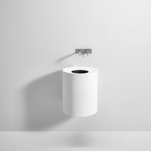 Lavabo sospeso - Rexa Design - in Corian® / rotondo / senza foro