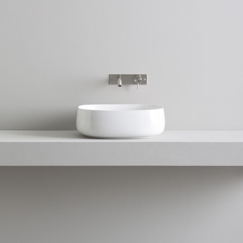Lavabo da appoggio - Rexa Design - in ceramica / su misura / rotondo