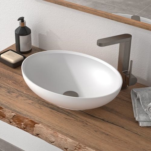 Lavabo da appoggio - AXO-R - Hasenkopf - in Solid Surface / ovale / senza foro