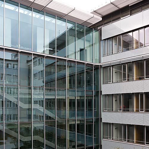 Facciata continua a montanti e traversi - HEADQUARTERS WGV, STUTTGART - Schindler - in alluminio e vetro
