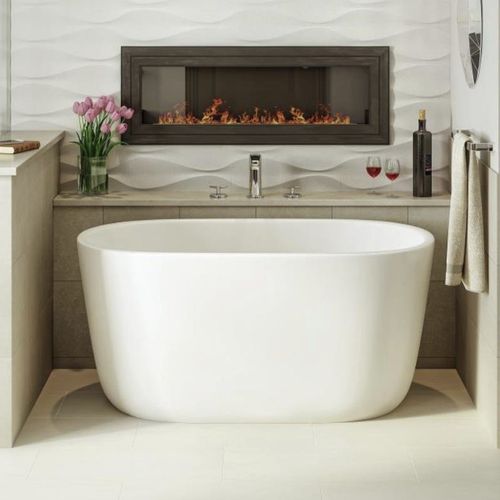 Vasca da bagno ovale - LULLABY-NANO-WHT™ - Aquatica Marmite SP. Z.o.o - ad isola / per ambiente abitativo / in Solid Surface