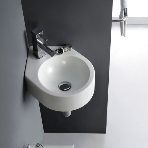 Lavabo sospeso - BRISTOL - Bath Collection S.L. - in porcellana / d'angolo / contemporaneo