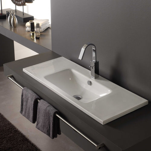 Lavabo da incasso - NUEVO MONTEVIDEO - Bath Collection S.L. - in porcellana / con piano integrato / rettangolare