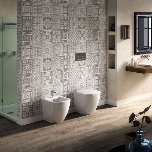 WC filomuro - FASTER - HIDRA - in ceramica / per uso residenziale / allungato