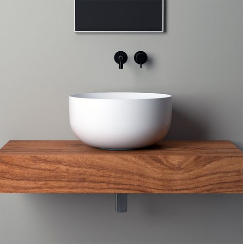 Lavabo da appoggio - SP22 - HIDRA - in ceramica / con piano integrato / rotondo