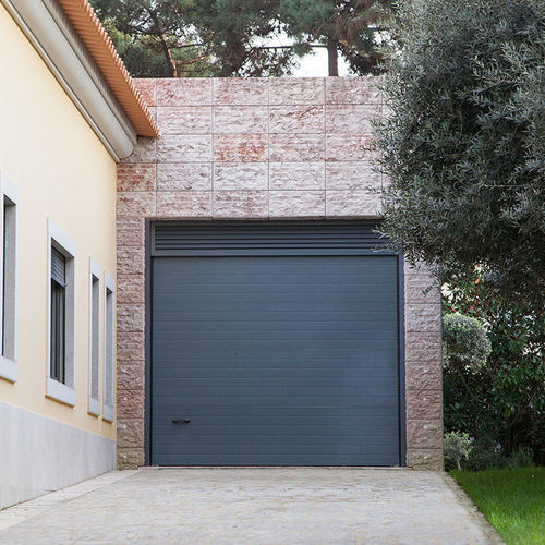 Porta sezionale per garage - BASIC - FLEXIDOOR SA - in lamiera d'acciaio / automatica / isolante
