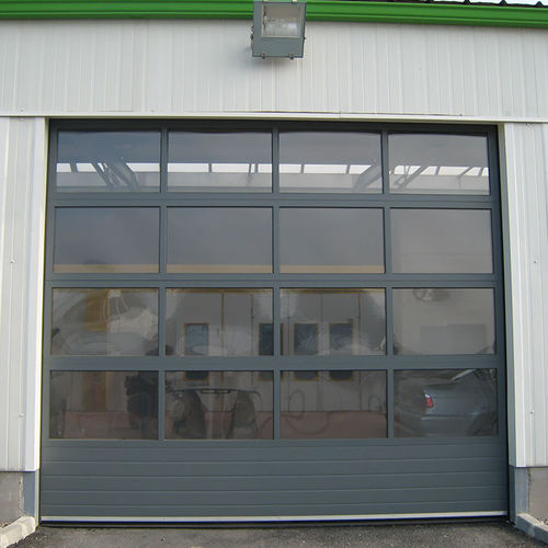 Porta industriale sezionale - FULL VISION - SMF Services - in metallo / automatica / per hangar