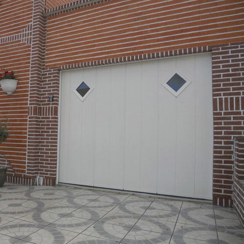 Porta scorrevole per garage - SMF Services - in alluminio / in acciaio inossidabile / in schiuma di poliuretano
