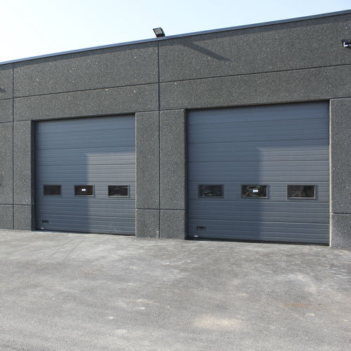 Porta industriale sezionale - SMF Services - in metallo / automatica / di sicurezza