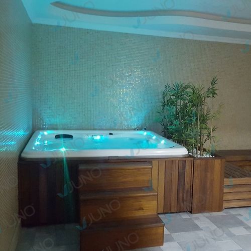Piscina spa fuoriterra - Juno SPA Design & Manufacture - rettangolare / multiposto / in composito