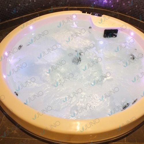 Piscina spa ad incasso - Juno SPA Design & Manufacture - angolare / 4 posti / in composito