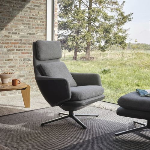 Poltrona contemporanea - vitra - in pelle / in ghisa di alluminio / con cuscino rimovibile
