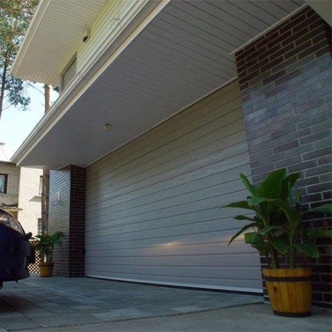 Porta sezionale per garage - IDO-HOME - IDOMUS - in acciaio / automatica / isolante
