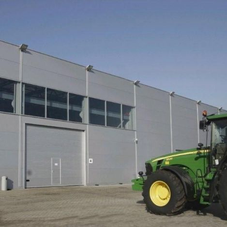 Porta industriale sezionale - IDO-PRO - IDOMUS - in acciaio / automatica