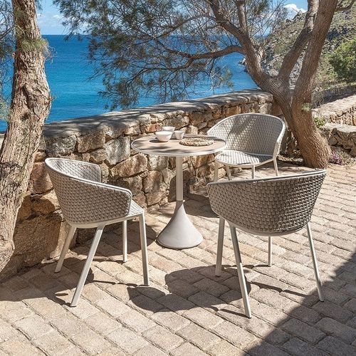 Tavolo contemporaneo - Concreto - Ethimo - in teak / in laminato / con supporto in alluminio