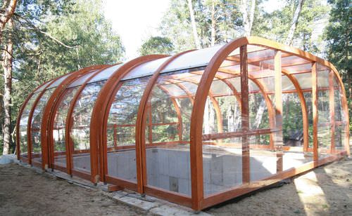 Copertura per piscina alta - EcoCurves - scorrevole / in legno / con azionamento manuale
