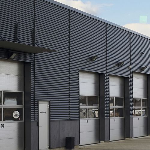 Rivestimento di facciata in pannelli - COLORCOAT® PE 25 - TATA STEEL - in acciaio / in zinco / a incastro