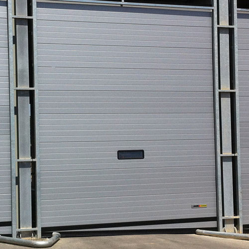 Porta industriale sezionale - MADE-TO-MEASURE - KOPRON - in metallo / automatica / termoisolante