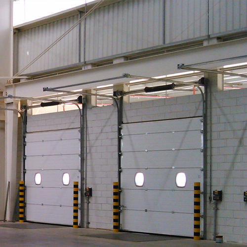 Porta industriale sezionale - SEMI-VERTICAL LINTEL - KOPRON - in metallo / automatica / termoisolante