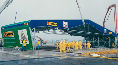 Capannone prefabbricato - KOPRON - in acciaio galvanizzato / industriale / scorrevole