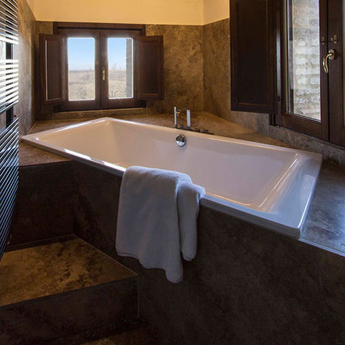 Bagno contemporaneo - Arredo di Pietra srl - in travertino / per hotel / su misura