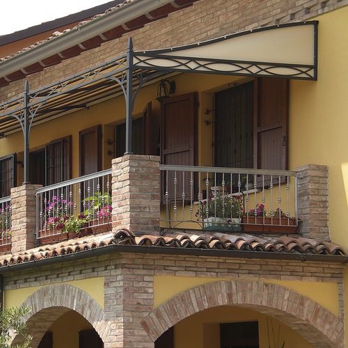 Pergola addossata - NOVECENTO - UNOSIDER - in ferro modellato / in PVC / con copertura in tela