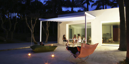Pergola addossata - SUITE - UNOSIDER - in alluminio / con copertura scorrevole in tela PVC / su misura