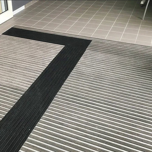 Tappeto d'ingresso per edifici pubblici - NUWAY TUFTIGUARD - Forbo Flooring Systems - in poliammide / in alluminio / in acciaio