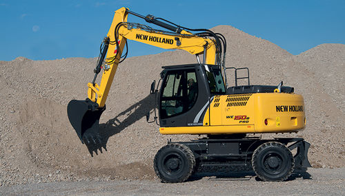 Escavatore intermedio - WE 150B PRO - New Holland Construction - gommato / multifunzione / per cantiere