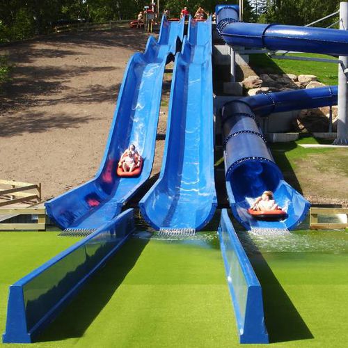 Scivolo girevole - AQUA SNAKE - Van Egdom - per parco acquatico / multiplo / per ciambelle gonfiabili