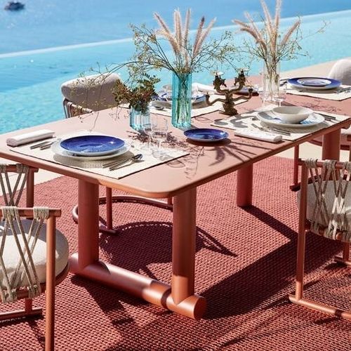 Tavolo da pranzo contemporaneo - TRAMPOLINE - Cassina - in calcestruzzo / in marmo / con base in alluminio termolaccato