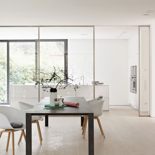 Cucina contemporanea - Villa Hamburg - eggersmann küchen GmbH & Co. KG - in Corian® / con isola / senza maniglie