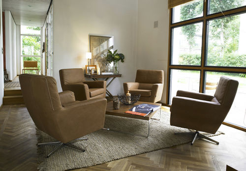 Poltrona contemporanea - COOPER - Furninova AB - in pelle / in tessuto / con base centrale