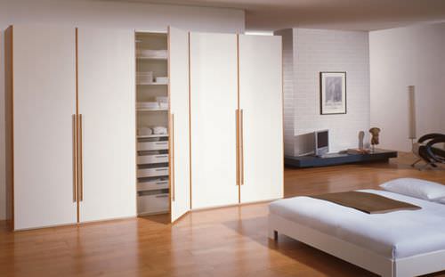 Armadio contemporaneo - AMBRI - Rüttimann AG - in legno / con ante battenti