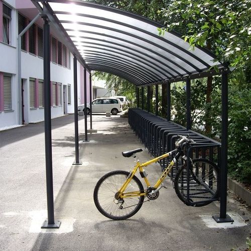 Rastrelliera per biciclette a pavimento - WING  - GUYON - con tettoia / per spazi pubblici / per zone urbane