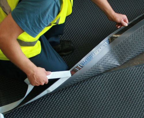 Pavimento in polipropilene - DampSafe 601 Slinline - Newton Waterproofing Systems - da interno / per il settore terziario / in rotoli