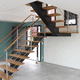 scala a U / con gradini in legno / con struttura in acciaio / contemporanea