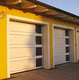 porta sezionale per garage / in alluminio / in vetro / automatica